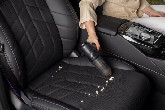 Driver uses Hedgehog TurboVAC to vacuum car seat crumbs